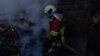 Ukraine -- Rescue workers at the site of Russian strike, Kyiv, 7Apr2025
